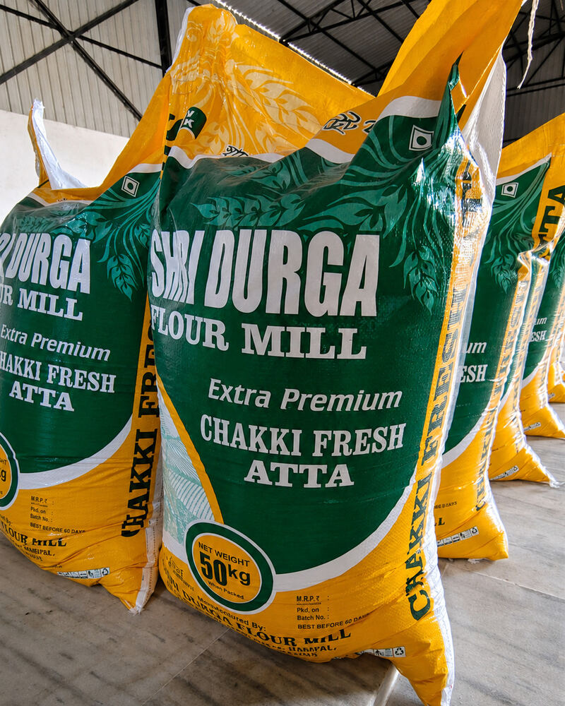 Current yellow and green 50 kg Chakki Fresh Atta bag from Shri Durga Flour Mill